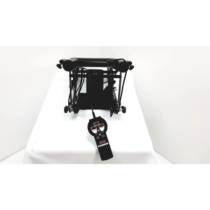 Black metal drum throne with attached remote control for knee therapy by furniss corporation phoenix 1850 knee cpm
