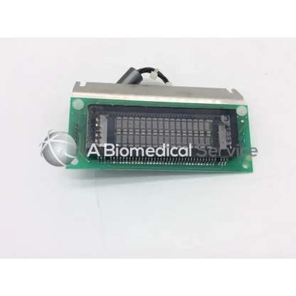 Green circuit board with silver metallic housing and black components of futaba us162sd03cc display module