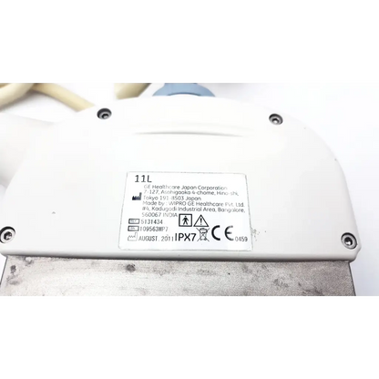 White plastic ge 5131434 11l linear array ultrasound transducer probe with manufacturer sticker from ge healthcare japan corporation