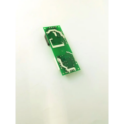 Green rectangular acpc board bbcb2-12 with silver soldered traces and component mounting holes for electronic use