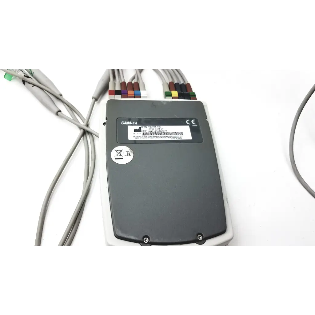 Back view of gray GE CAM 14 HD acquisition module cam medical device with multiple colored cables connected