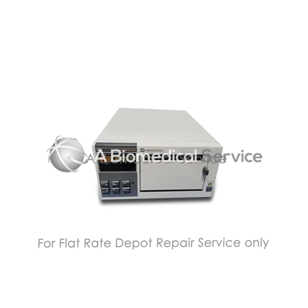 Gray rectangular medical device with a digital display and control panel on the front.