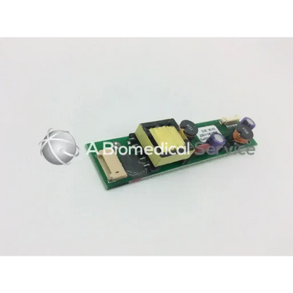 Green rectangular circuit board with black and yellow components and beige connector for ge dash 4000 patient monitor lcd display