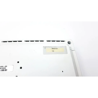 White plastic base with ventilation slits and yellow model sticker on back of ge datex-ohmeda anesthesia patient monitor