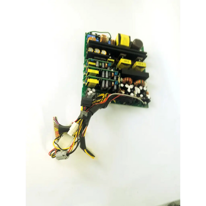 Green circuit board with yellow capacitors and black components of healthcare aps400w ultrasound board