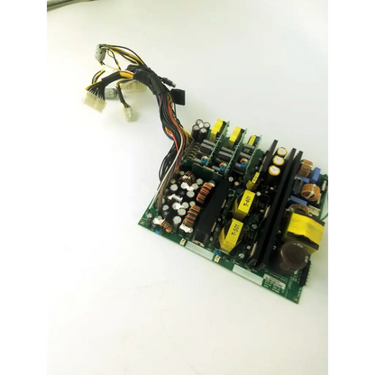 Green circuit board with yellow capacitors and black wiring in the healthcare aps400w ultrasound board