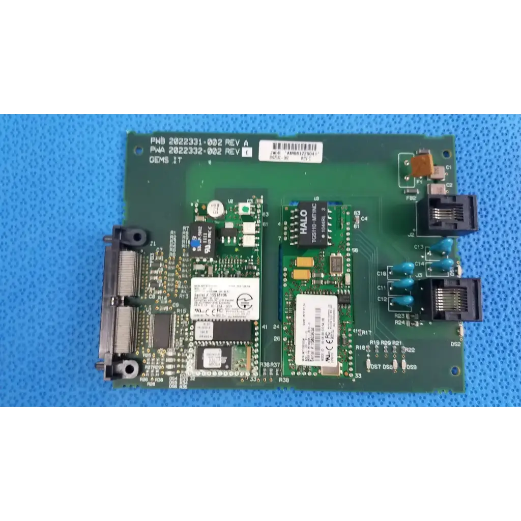 Green circuit board with black connectors and components for GE MAC 5500 LAN internal modem communication pcb assembly