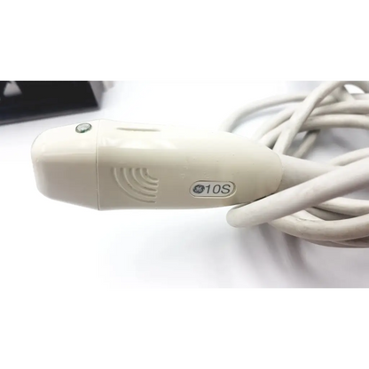 Cream-colored GE Medical System 2298593 rev 0 ultrasound transducer with ergonomic design and coiled white cable