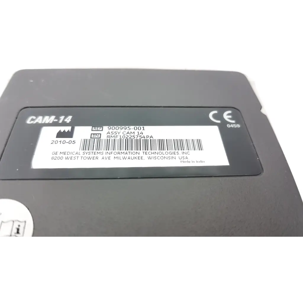 Black ge medical system cam-14 ecg acquisition module with white label showing serial and reference numbers