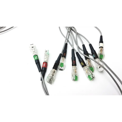 Set of six gray cables with clear labeled connectors in green and black for ge medical systems cam-14 acquisition module
