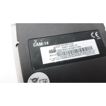 Black ge medical systems cam-14 acquisition module with white label showing serial and reference numbers