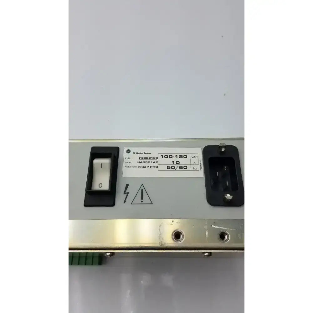 Gray metal pro power supply with black power switch and plug for ge medical vivid 7 pro medical device back side