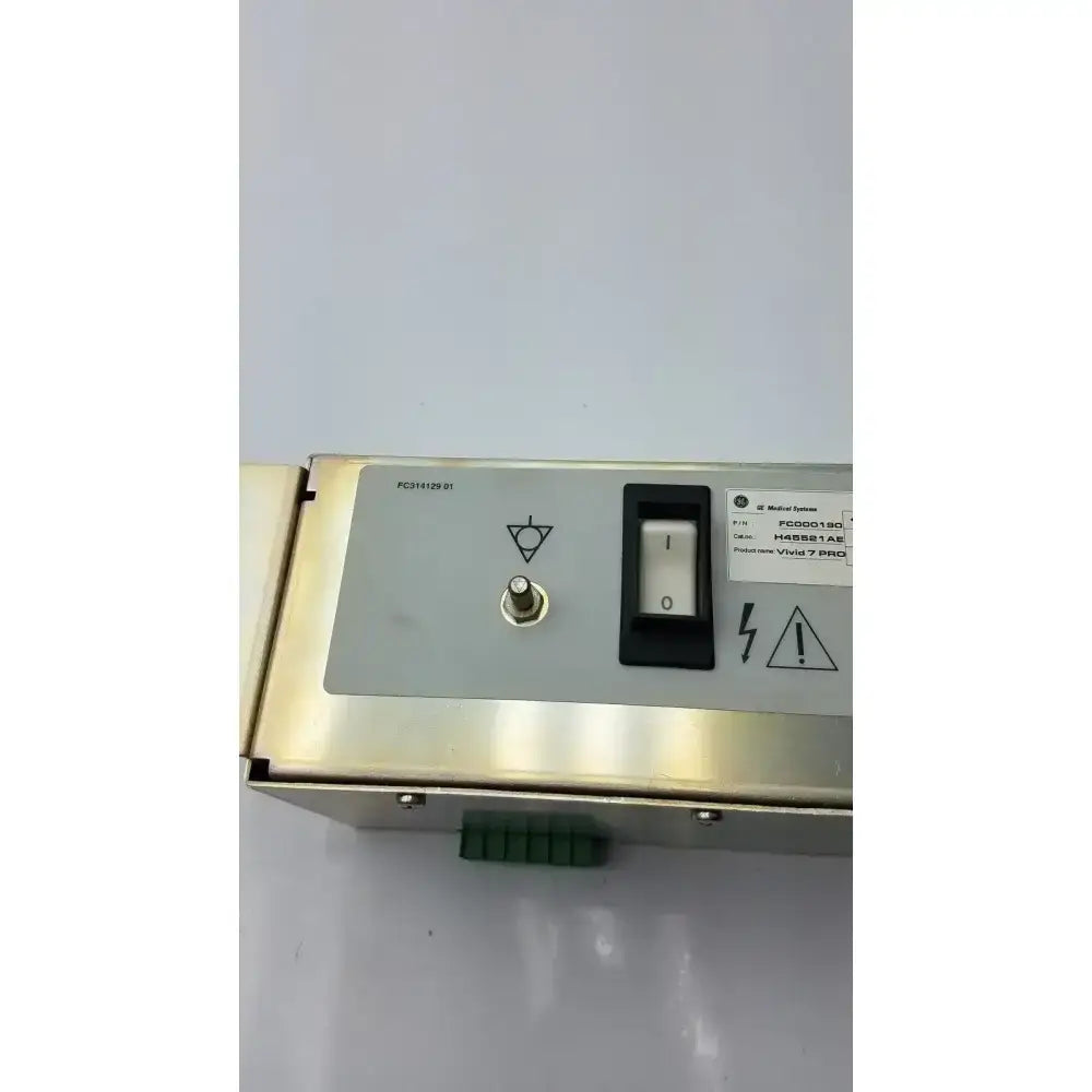 Silver metallic industrial medical vivid pro power supply with black toggle switch and warning symbols p n fc000190