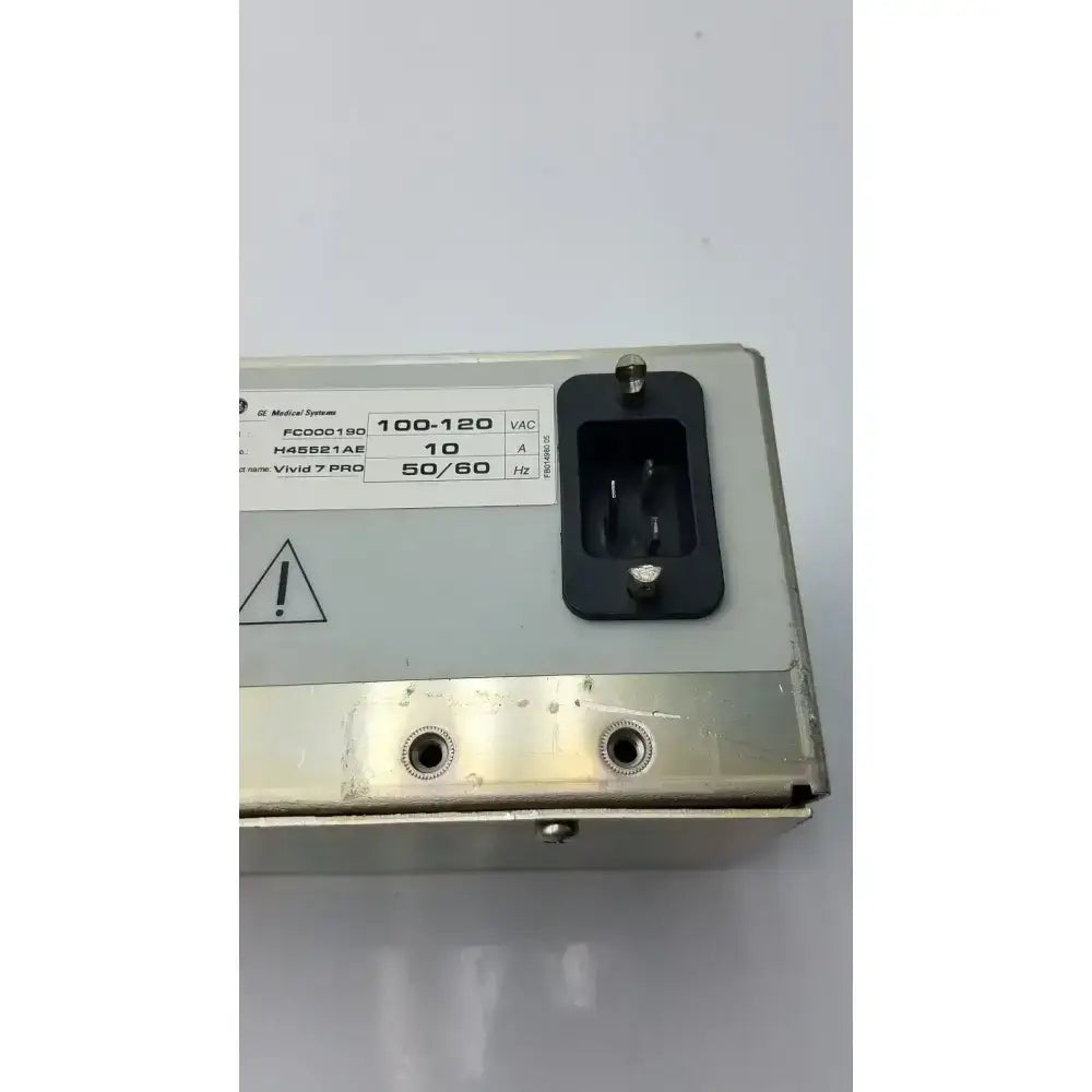 Silver metallic medical vivid 7 pro power supply with black ac input socket and white specification label back side