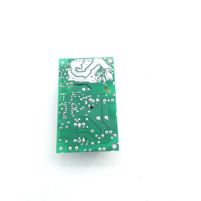 Green rectangular printed circuit board with silver soldered components and white silkscreen markings for bedside monitor parts