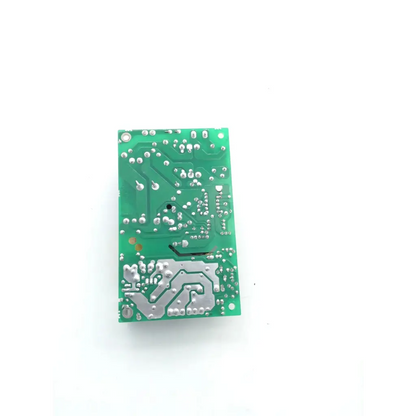 Green rectangular circuit board with silver soldered components and copper traces for ge s5 fm bedside monitor parts