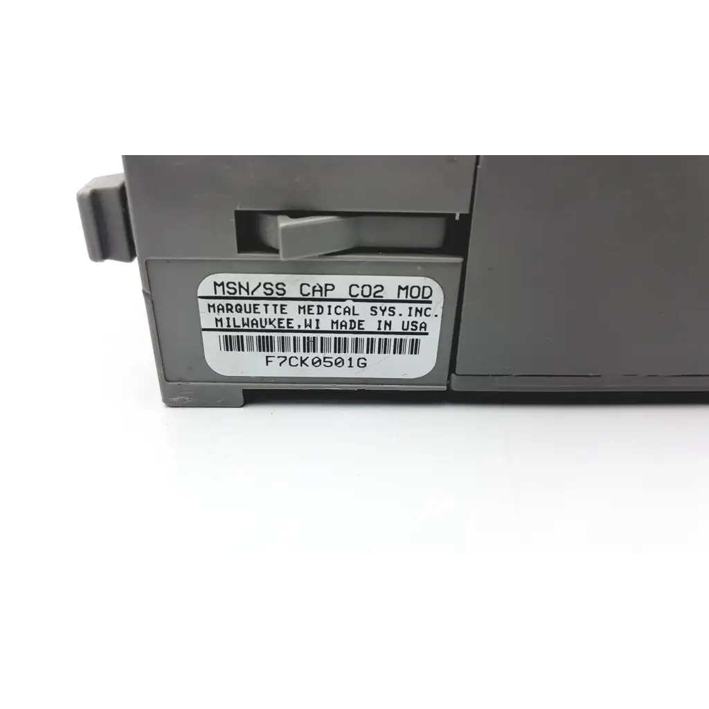 Gray plastic solar capnostat mainstream cap co2 module labeled marquette medical sys for respiratory monitoring