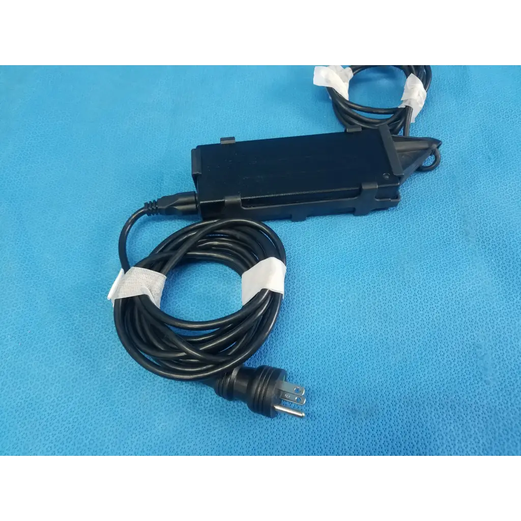Black plastic ge twadp100 adapter power supply with coiled cable and white tape for vivid i vivid q ultrasound use