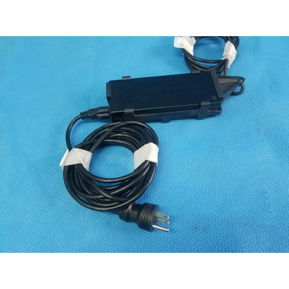 Black plastic ge twadp100 adapter power supply with coiled cable and white tape for vivid i vivid q ultrasound use