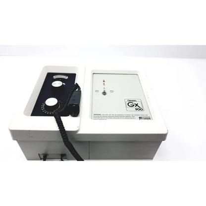 White plastic general gx 900 dental handpiece with black control panel and coiled cord for wall mount dental use