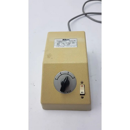 Beige genuine nikon transformer xn made in japan with voltage dial and toggle switch for precise power control