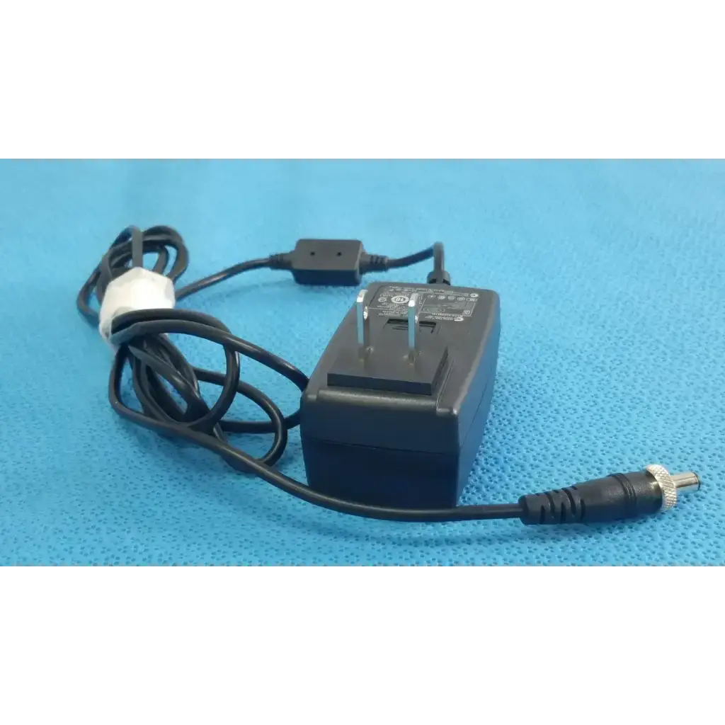 Black plastic gt-41052-1509 adapter charger with coiled power cord and metallic barrel connector power adapter