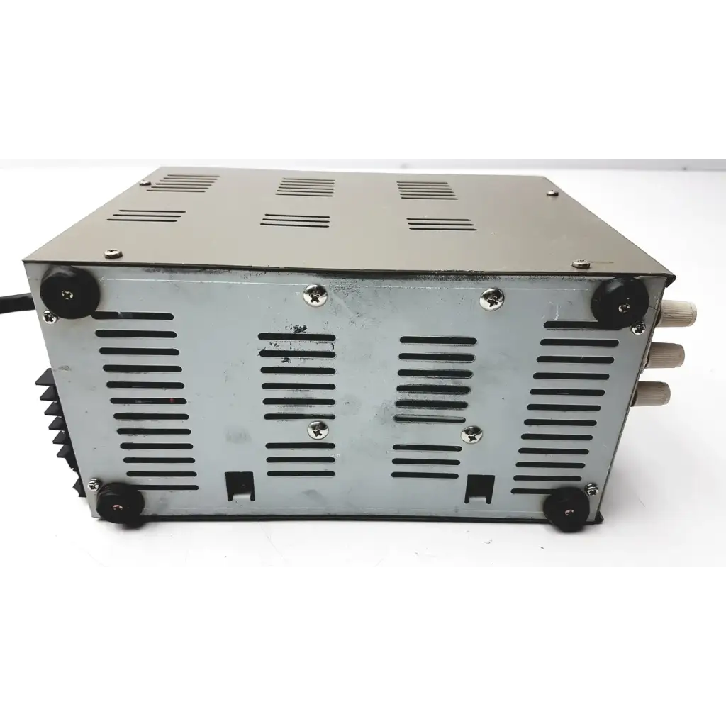 Silver metallic goldstar dc power supply gp 303 with black rubber feet and ventilation slits for reuse medical use