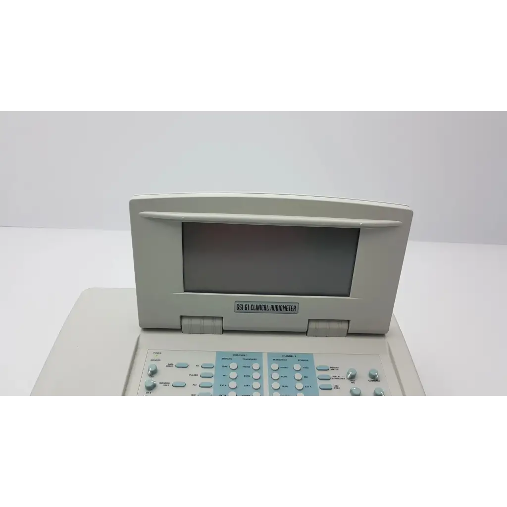 Beige stadler gsi 61 clinical audiometer 1761-97xx with rectangular screen and light blue control panel with buttons