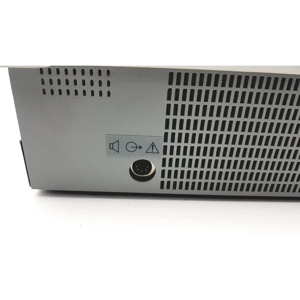 Silver metallic stadler gsi clinical audiometer 1761-97xx with perforated grille and circular input port back side view