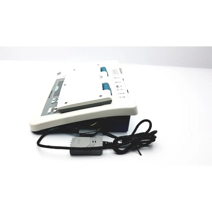 White medical-grade dental handpiece with teal accents and black cord for gsi tympstar middle ear analyzer use