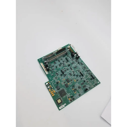 Green printed circuit board gsi fab 2000-0712 rev 2 analog board with various electronic components and connectors