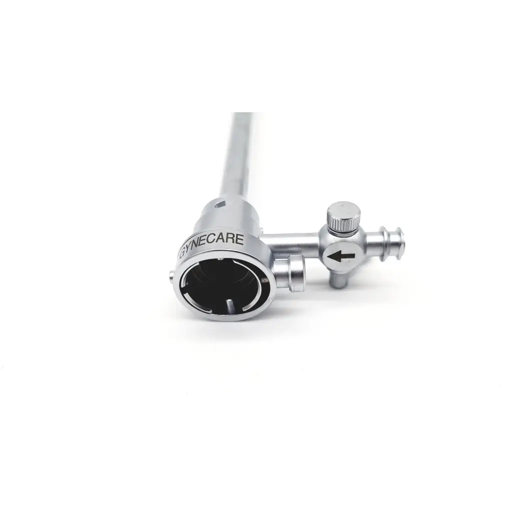 Silver metallic gynecare versapoint sheath da54-17 with cylindrical body and small knob featuring arrow indicator