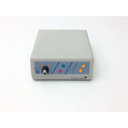 Gray rectangular gynecare md010 motor drive unit with blue control panel and colorful buttons for medical use