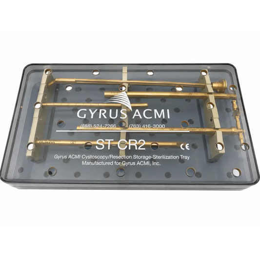 Gold-colored metal surgical instruments in a gyrus acmi sterilization tray labeled st cr2 for medical equipment use