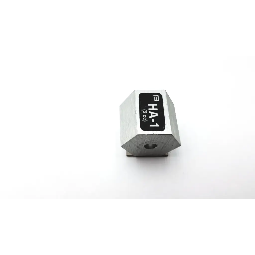 Silver hexagonal metal weight labeled fha-1 2cc for precision measurement in ha-1 2cc product
