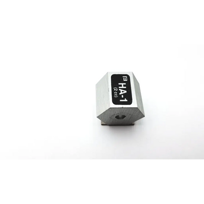 Silver hexagonal metal weight labeled fha-1 2cc for precision measurement in ha-1 2cc product