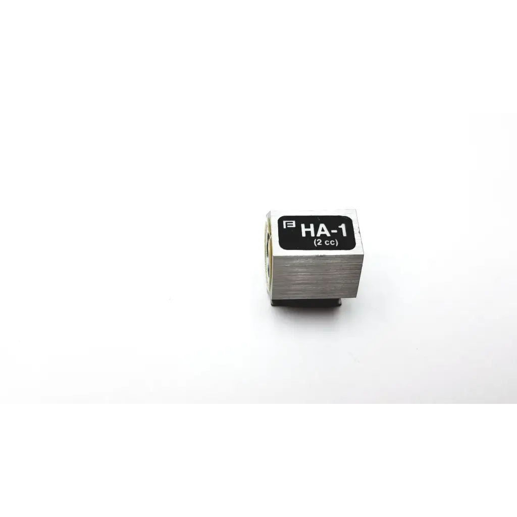 Silver metallic ha-1 2 cc cylindrical container with brushed finish and black label for precise application