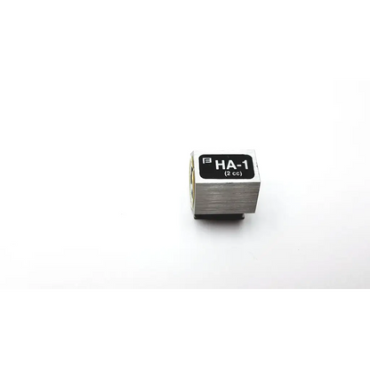Silver metallic ha-1 2 cc cylindrical container with brushed finish and black label for precise application