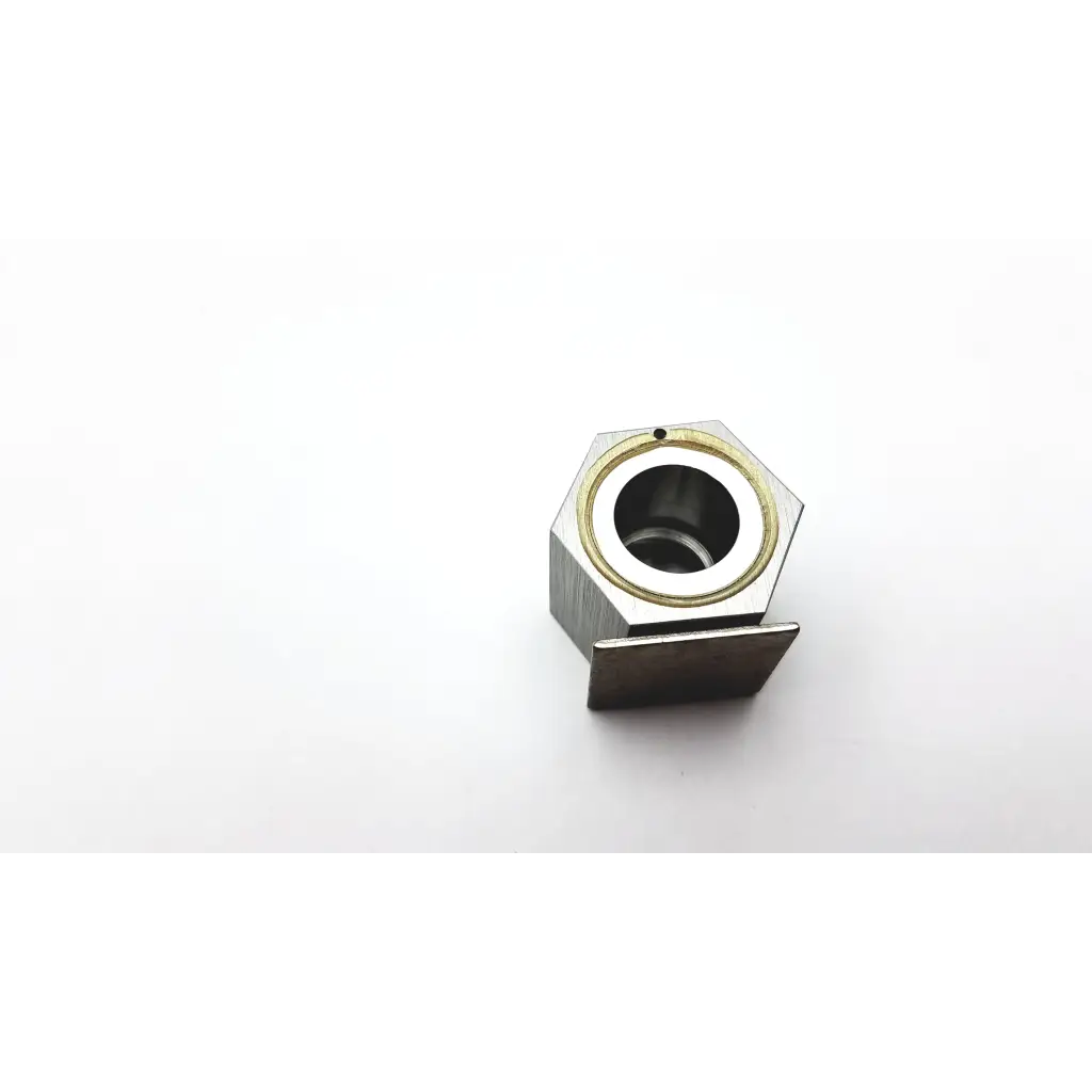 Hexagonal metallic tool holder ha-1 2cc with central bore and gold-colored inner ring for secure mounting