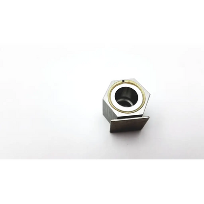 Hexagonal metallic tool holder ha-1 2cc with central bore and gold-colored inner ring for secure mounting