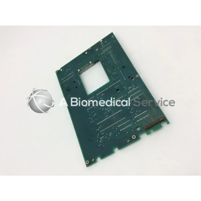 Green rectangular circuit board with central cutout and solder points for haemonetics assy c35396 sch c35397 board