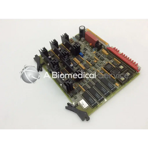 Green circuit board pump driver card by haemonetics corp with black integrated circuits red connectors and heat sinks