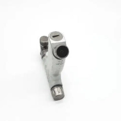 Silver-colored metal pipe fitting with threaded ends and black top component for hall surgical oscillator ad5-767