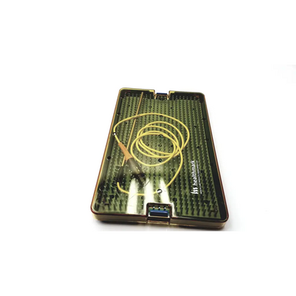 A sleek dark green and black medical instrument tray with coiled yellow tubing and precision tool for halyard healthmark rf probe 100g