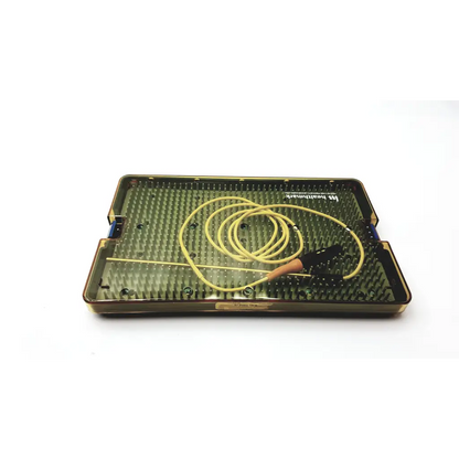 A yellow medical catheter with black handle coiled inside an olive-green surgical tray for halyard healthmark rf probe 100g