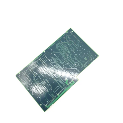 Green printed circuit board with silver traces and pads for component mounting in hark motor pcba 35120 rev a s/n 5474