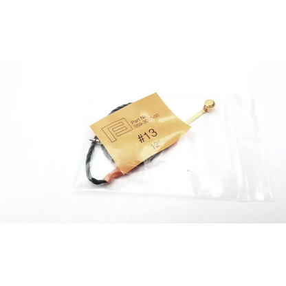 Hearing aid programming adapter with gold metal antenna black insulated wire and small spherical tip in clear plastic packaging