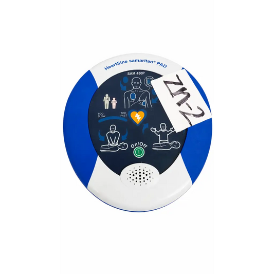 Blue and white heartsine samaritan pad aed defibrillator with instructional diagrams on circular face in refurbished kit