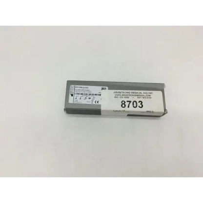 Gray rectangular medical device box with white label showing arthrostrong medical fiber optic blade model 8703 for optic blade mac