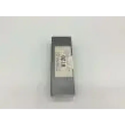 Gray rectangular heine comp laryngoscope battery handle with white label and printed text for medical use